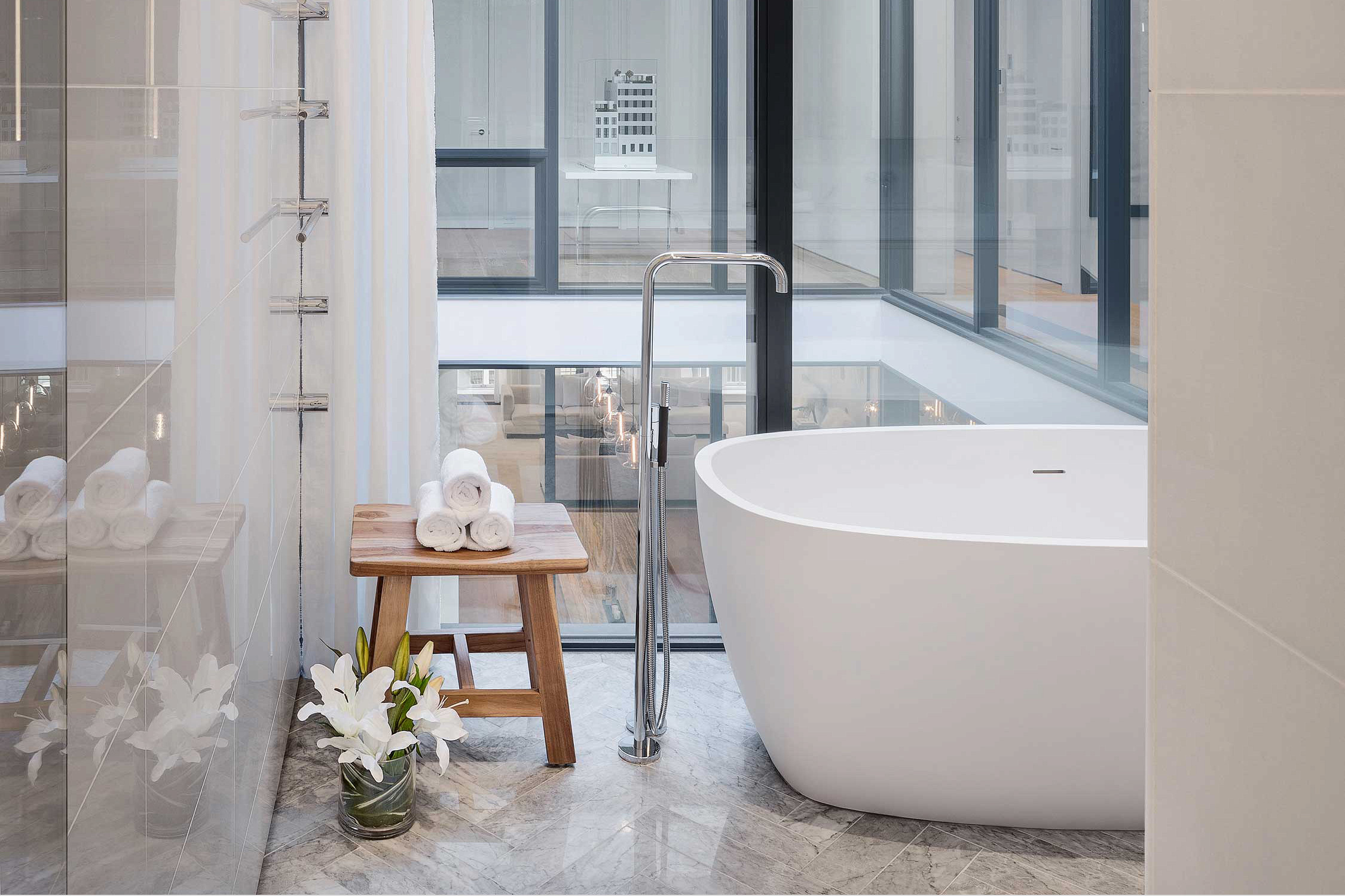 [Elle Decor] Armoires and Sofas and Chairs – Oh My! Meet the New Tricked-Out Bathroom